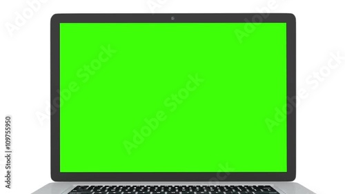 Isolated laptop with green screen on white background. Camera rotating around notebook. Template empty green screen.
