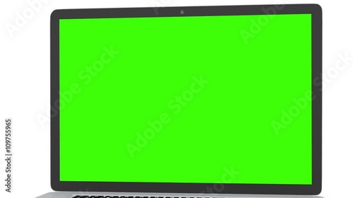 Isolated laptop with green screen on white background. Camera rotating around notebook. Template empty green screen.