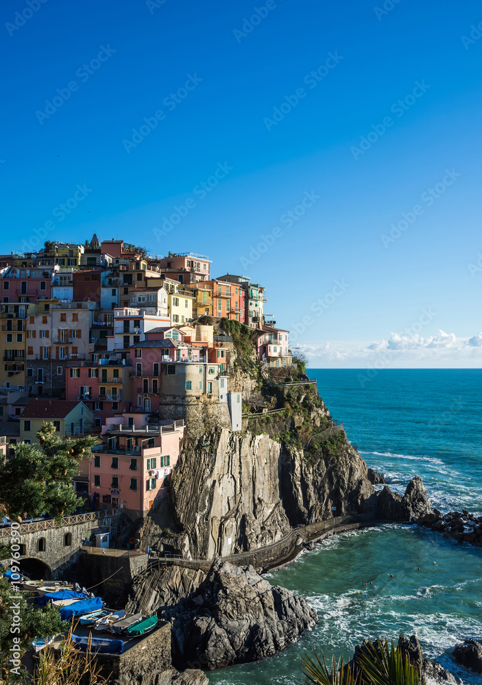 Scenic view of Manarola village and the sea in Liguria region, Cinque Terre, northern Italy on clear day.