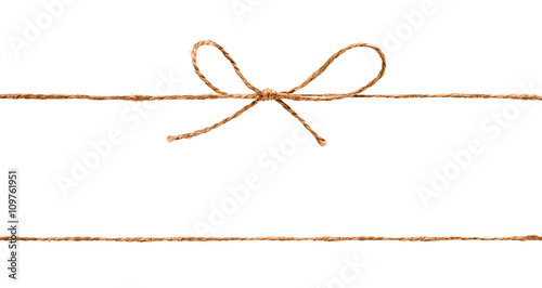 Rope and bow isolated on white background photo