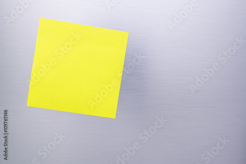 Blank sticky note on The refrigerator (for your text)