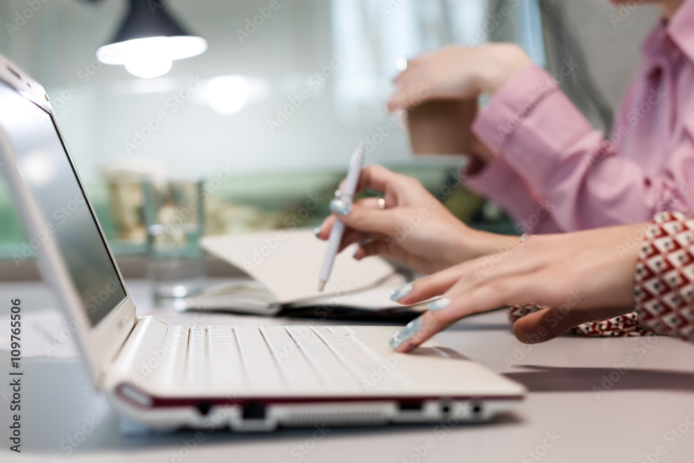 Modern Office Background Computer and female Hands touching Keyboard Modern Office Background Computer and female Hands touching Keyboard
