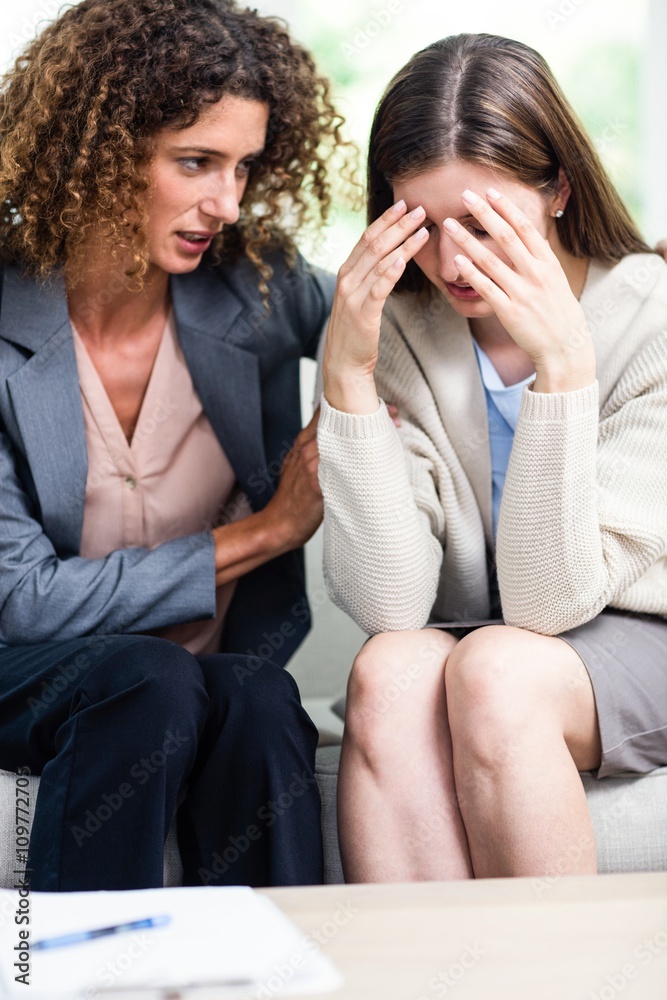 Close-up of psychologist counselling depressed woman Close-up of psychologist counselling depressed woman