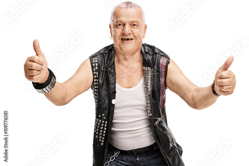 Canvas-taulu Mature punk giving thumbs up