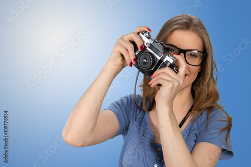 Woman photographer with camera © fotofabrika