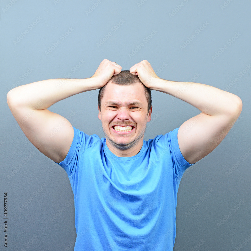 Portrait of a man suffering from headache Portrait of a man suffering from headache