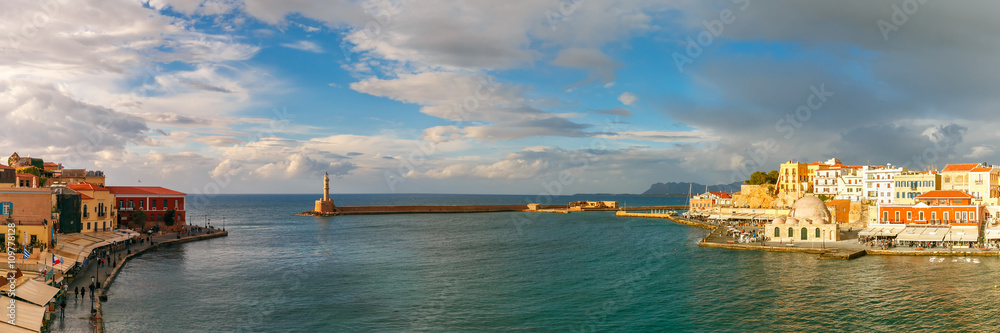 Picturesque panoramic view of old harbour of Chania with Lighthouse and Kucuk Hasan Pasha Mosque, Crete, Greece