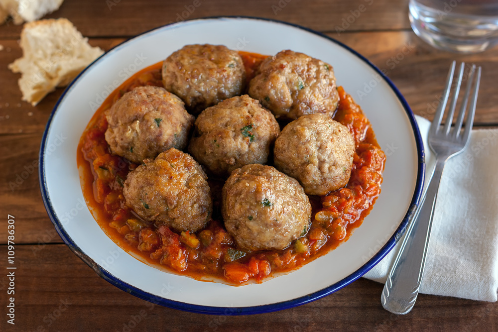 Spanish pisto (typical vegetables stew) with meatballs Spanish pisto (typical vegetables stew) with meatballs
