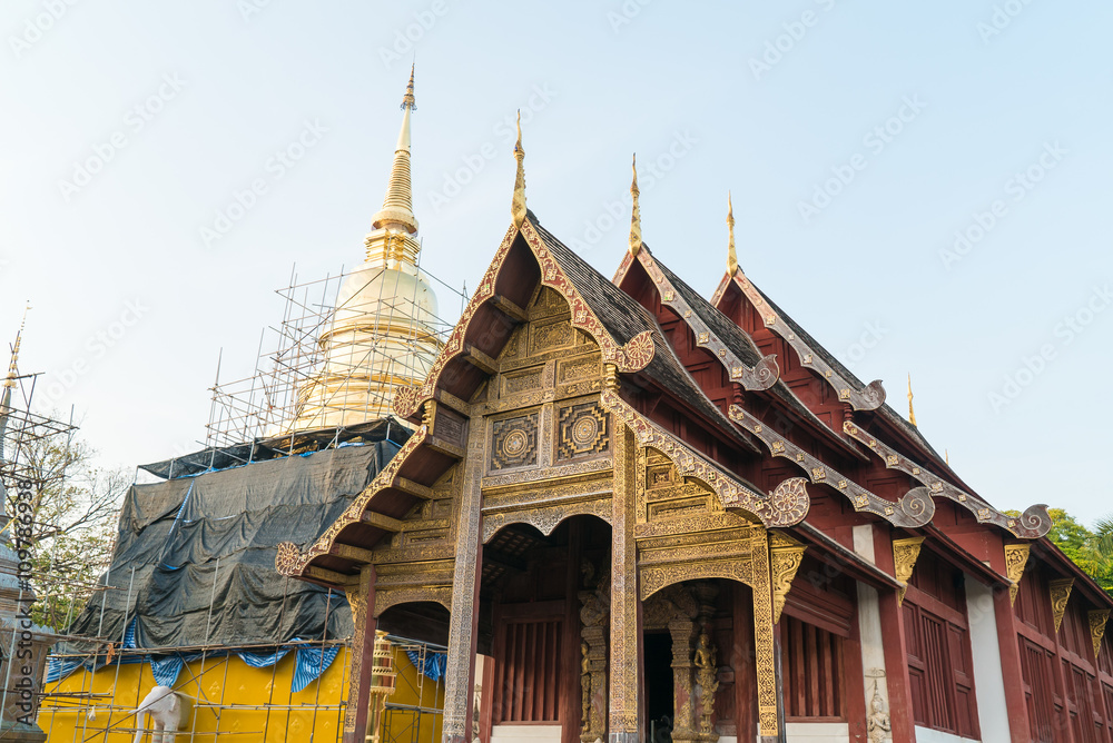 Fototapeta premium Pagoda under construction at Wat Phra Singh the buddhist temple in Chiang Mai,Thailand.