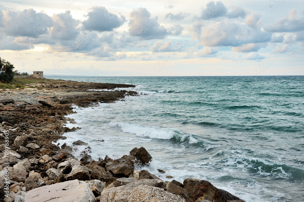 Ostuni, sea on the rocks in a summer cloudy day, Apulia, Italy