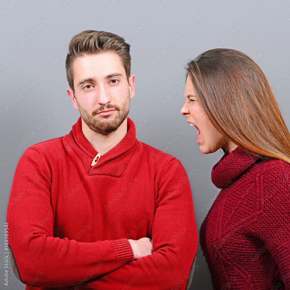 Man doenst care she is screaming at him and behaving tolerant Man doenst care she is screaming at him and behaving tolerant