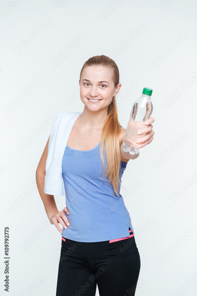Happy sports woman holding bottle with water Happy sports woman holding bottle with water