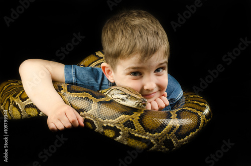 happy kid and giant snake   