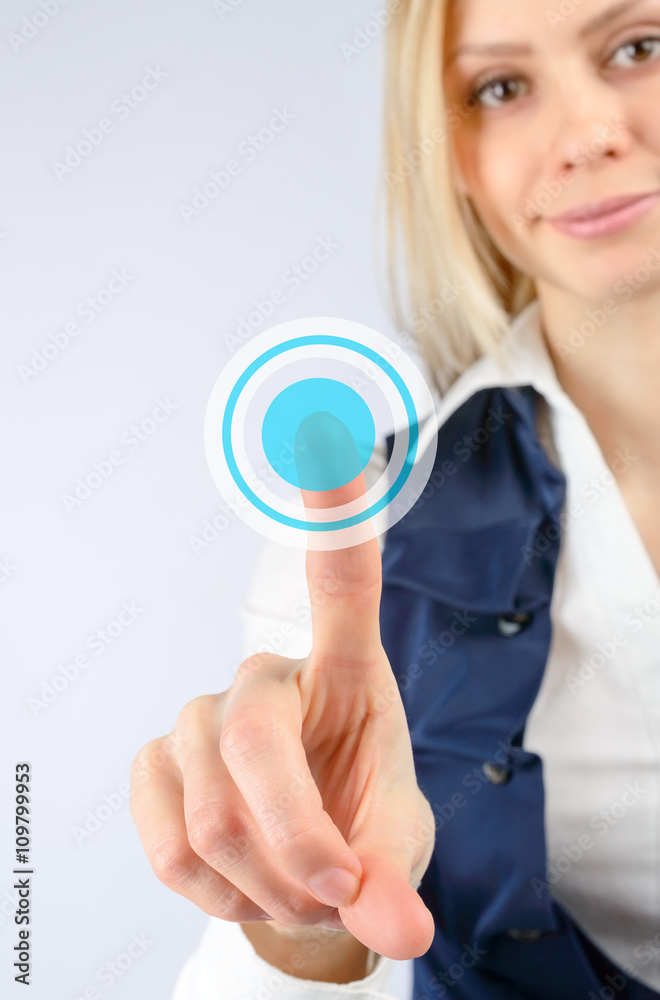 Woman presses a finger on the touch button Woman presses a finger on the touch button