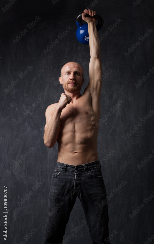 Fototapeta premium Exercise With Kettle Bell.