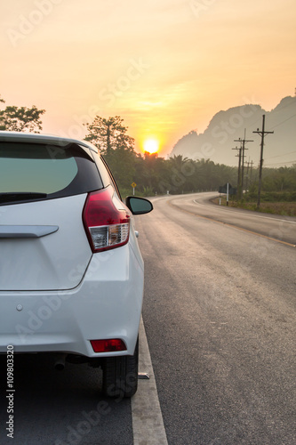 Sunny day at a country, the view on the road level from behind t