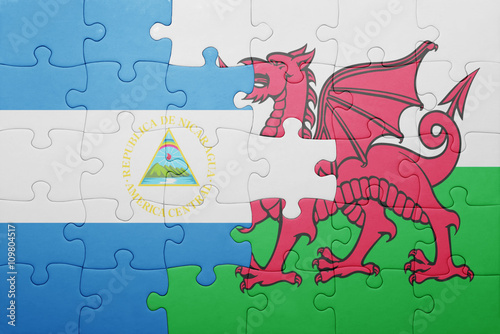 puzzle with the national flag of wales and nicaragua