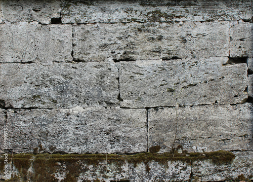 The texture of the stones in blank wall. photo