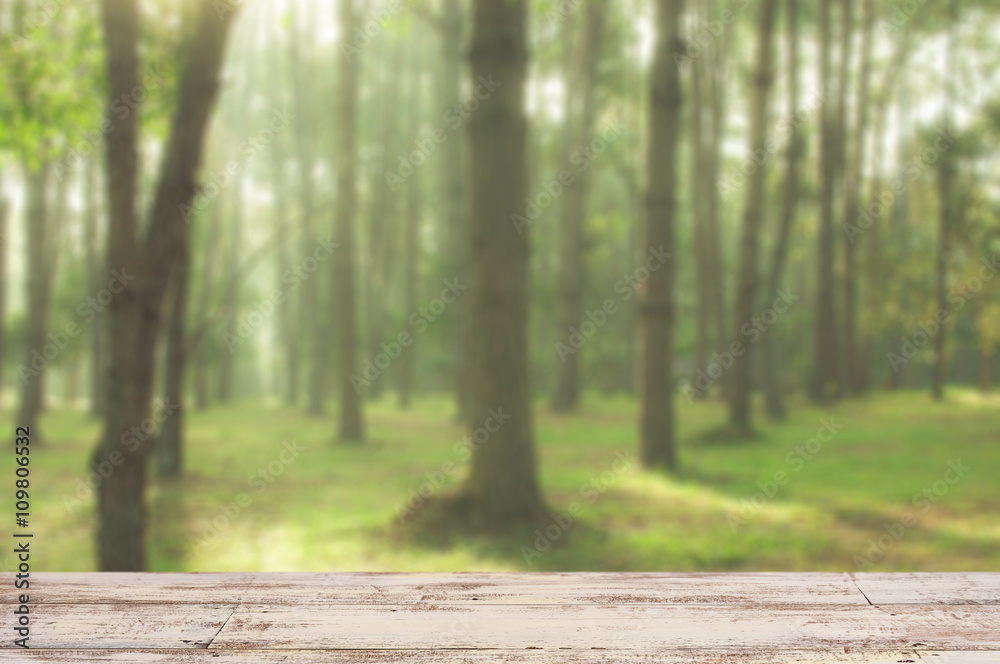 An empty white table with beautiful background blur that can be deployed as needed . Including its advertising An empty white table with beautiful background blur that can be deployed as needed . Including its advertising