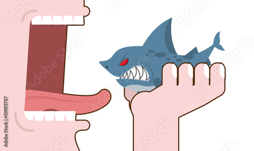 Man eating shark. Destruction of marine predator. Consumption un