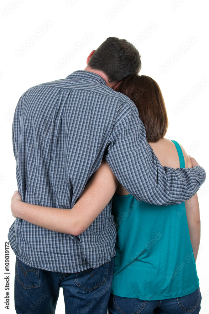 Back view young couple hug, beautiful friendly girl and guy together. Back view young couple hug, beautiful friendly girl and guy together.
