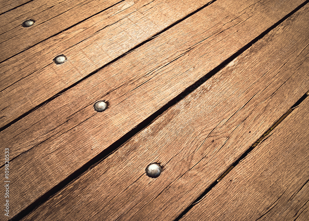 Fototapeta premium old wood board with rivets