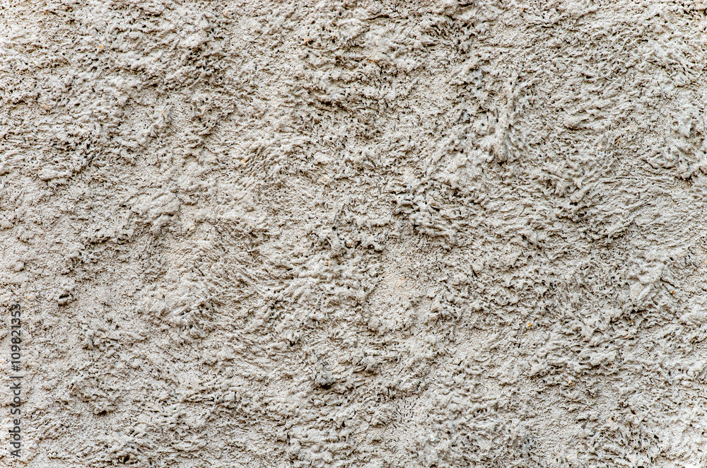 The texture of cement plaster.