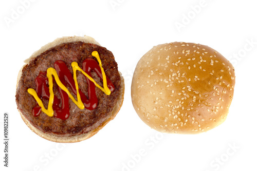 burger sandwich topped with ketchup and mustard sauce