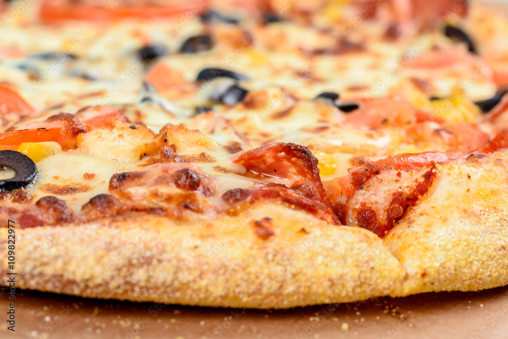 Italian Pizza With Mozzarella, Prosciutto, Tomatoes And Olives Italian Pizza With Mozzarella, Prosciutto, Tomatoes And Olives