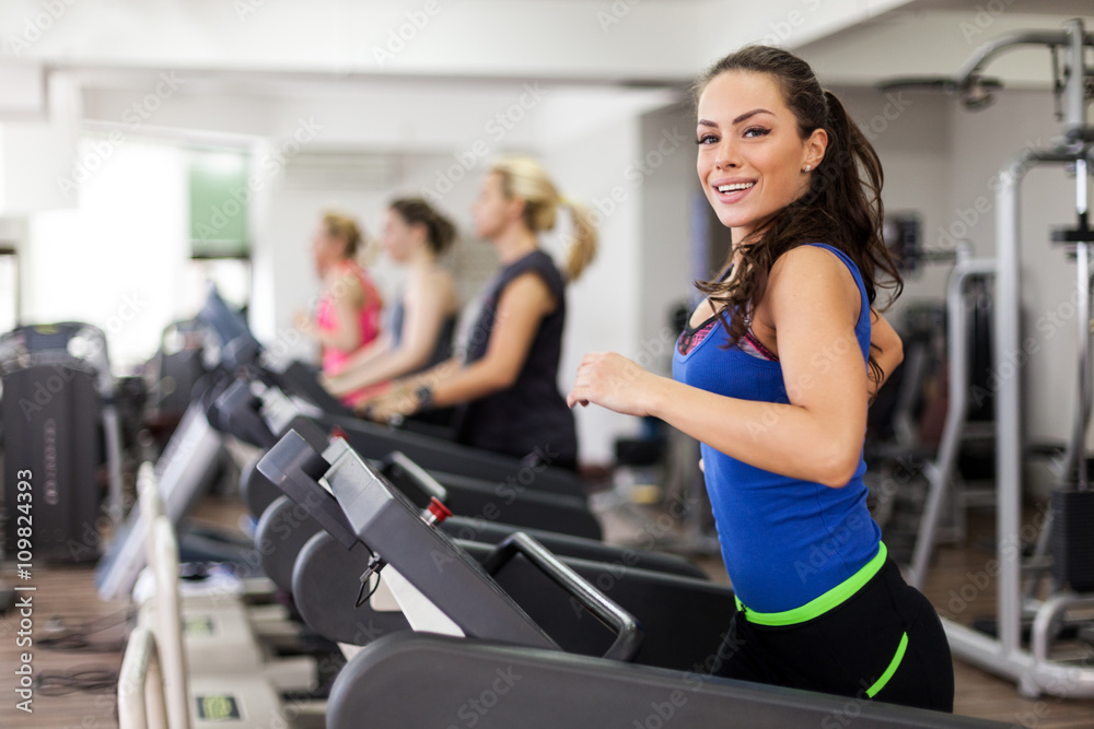 Beautiful brunette on a treadmill Beautiful brunette on a treadmill