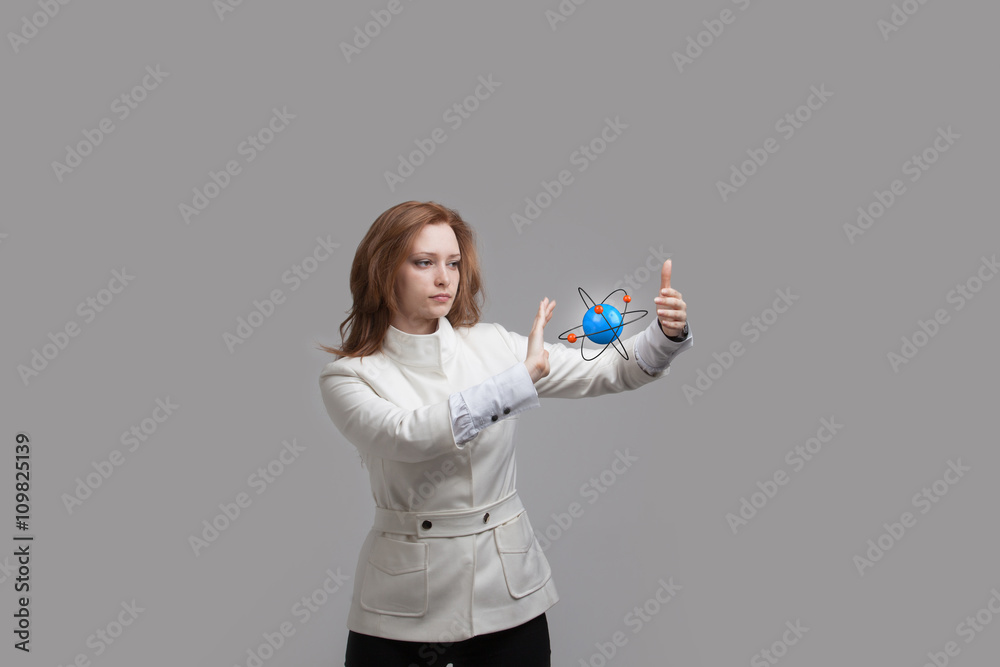 Woman scientist with atom model, research concept Woman scientist with atom model, research concept