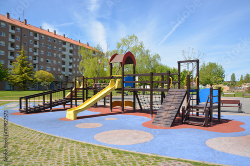 columpios en un parque infantil photo