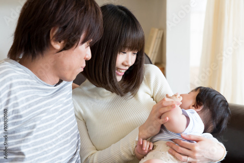 portrait of young asian family relaxing