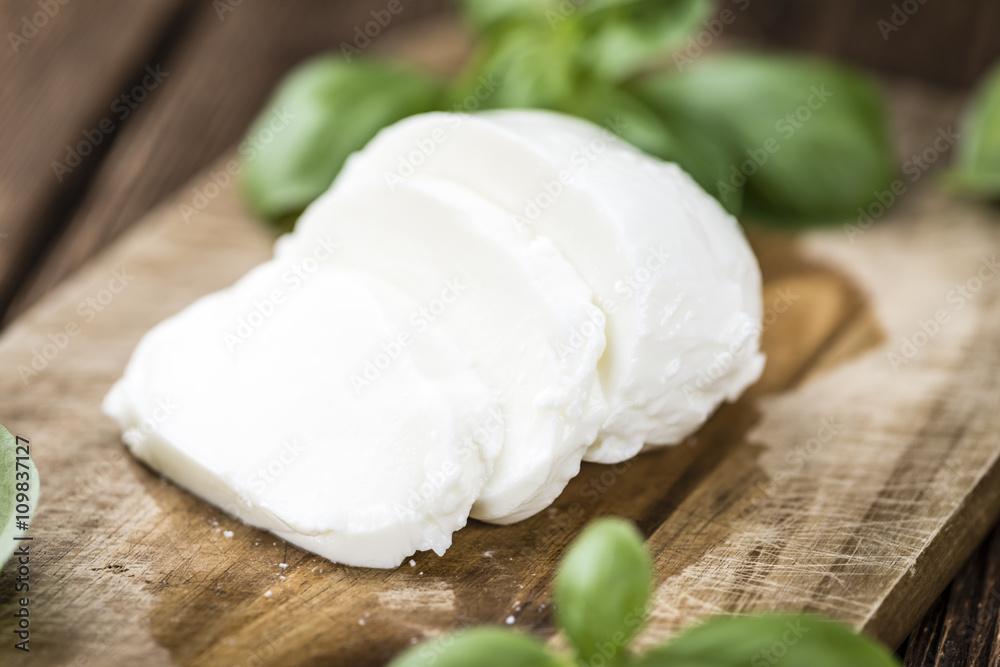 Old wooden table with Mozzarella Old wooden table with Mozzarella