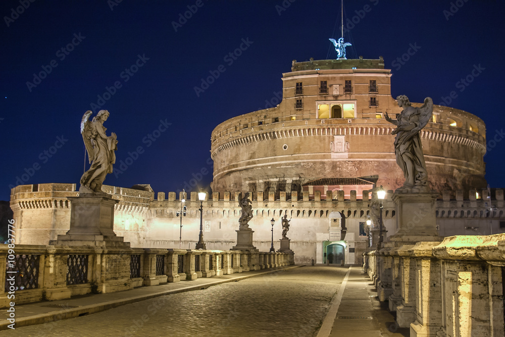 Fototapeta premium Night view over ponte sant angelo leading to castel sant angelo at night. Rome, Italy.