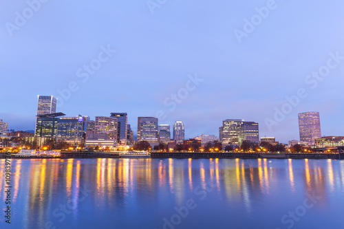 water cityscape and skyline of portland in blue sky