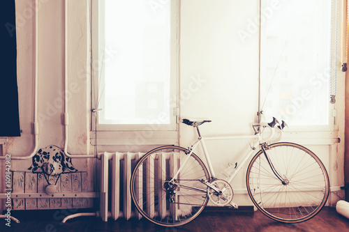 White retro bicycle in studio
