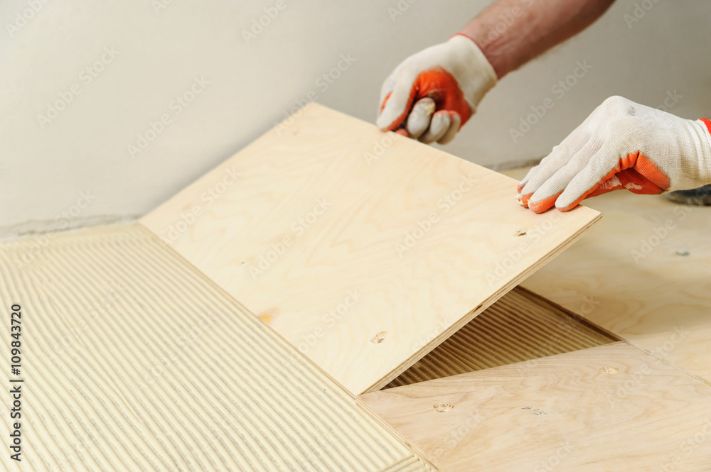 Laying plywood on the floor. Laying plywood on the floor.