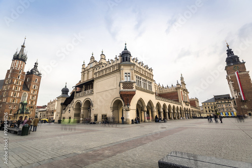 Market square with historic church, cloth hall, town hall in Krakow, Poland, Europe
