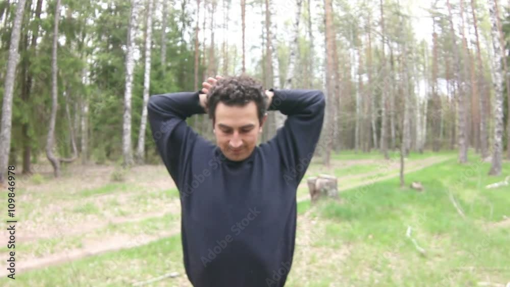 Man Doing Exercises in the Woods Man Doing Exercises in the Woods