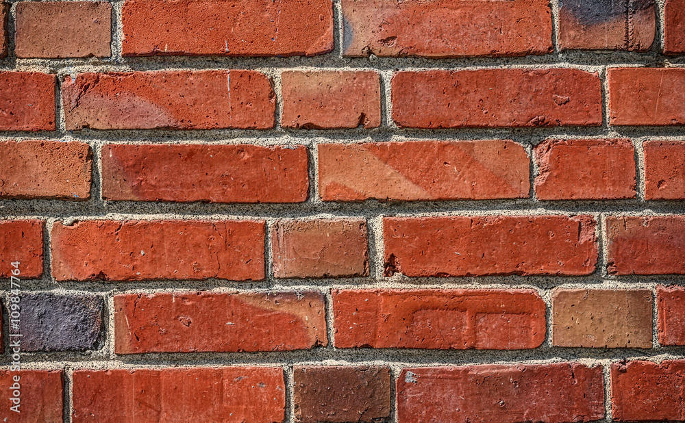 Obraz premium Vibrant and Saturated Brick Wall for Texture Background