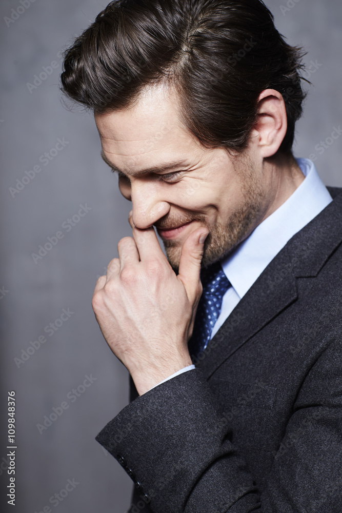 Smiling businessman in suit, close up Smiling businessman in suit, close up
