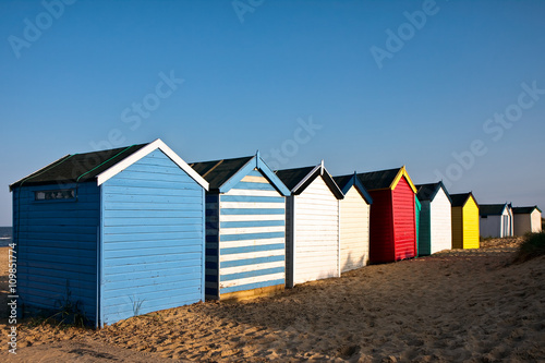 Colourful beach huts on Southwold beach Suffolk © philipbird123