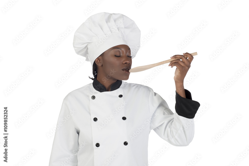 female chef tasting her work