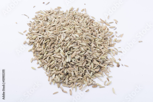 fennel seeds on white background