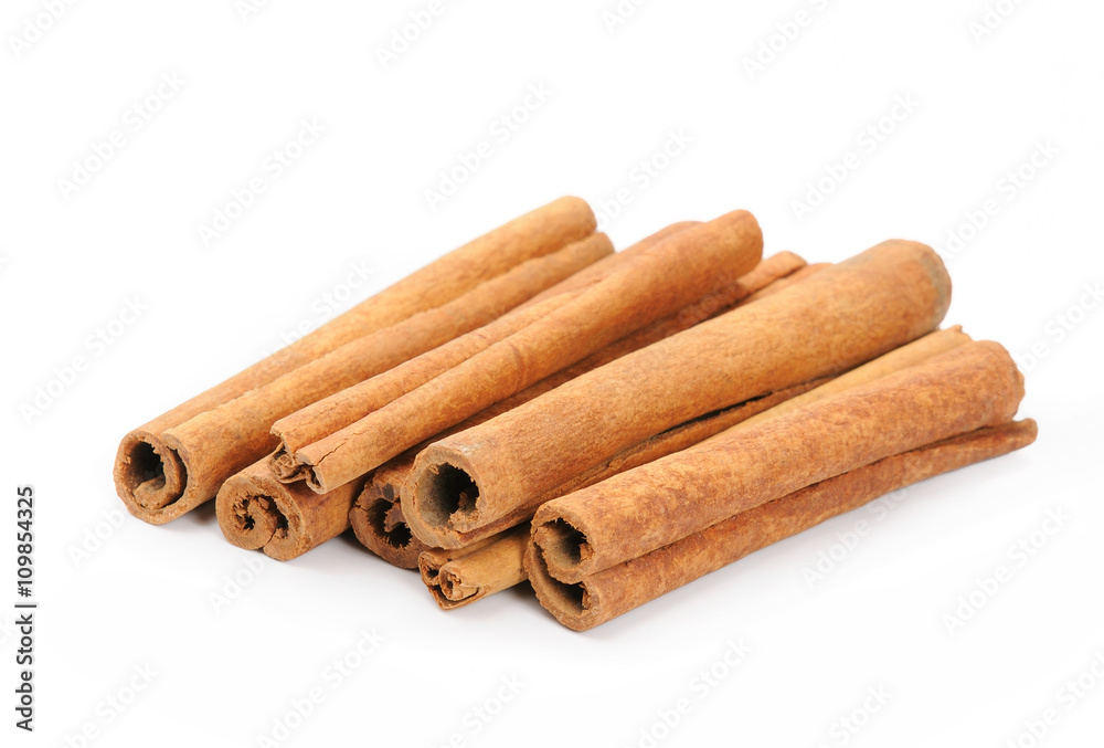 Cinnamon on white background Cinnamon on white background