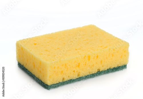 Yellow kitchen sponge isolated on white background.