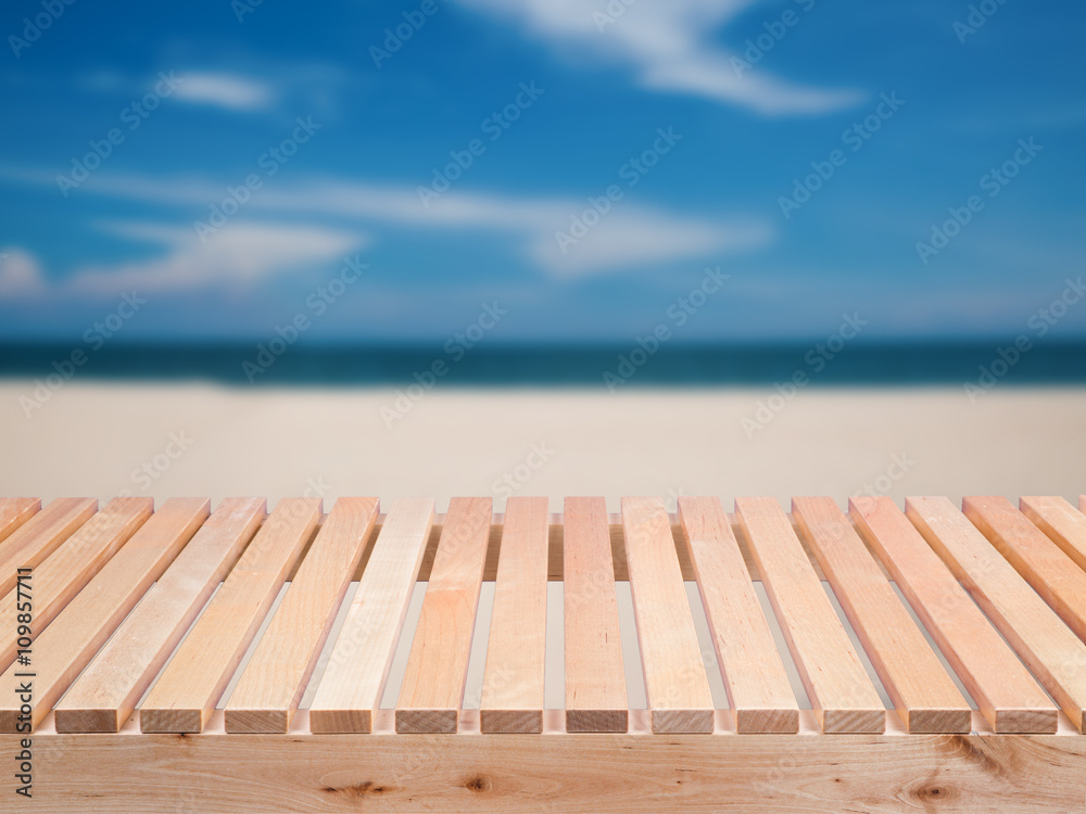 wooden bench with beach background