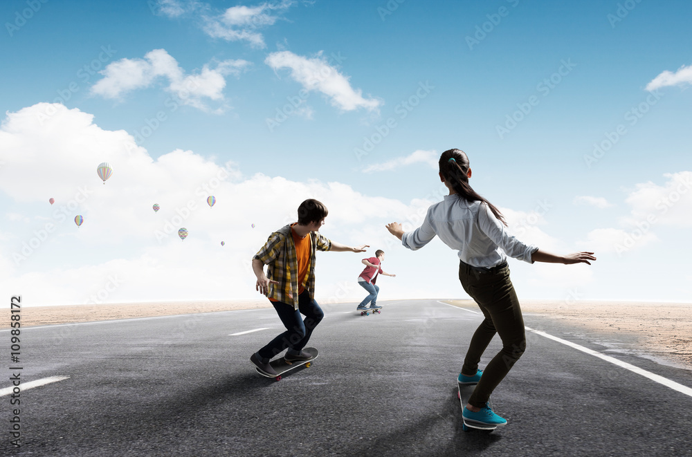 Fototapeta premium Young people riding skateboard