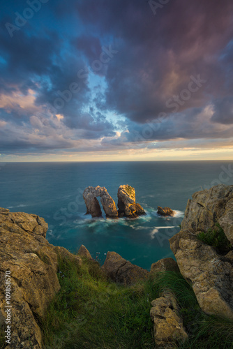 Sunrise at the coast, ocean and rocks in Cantabria, Spain